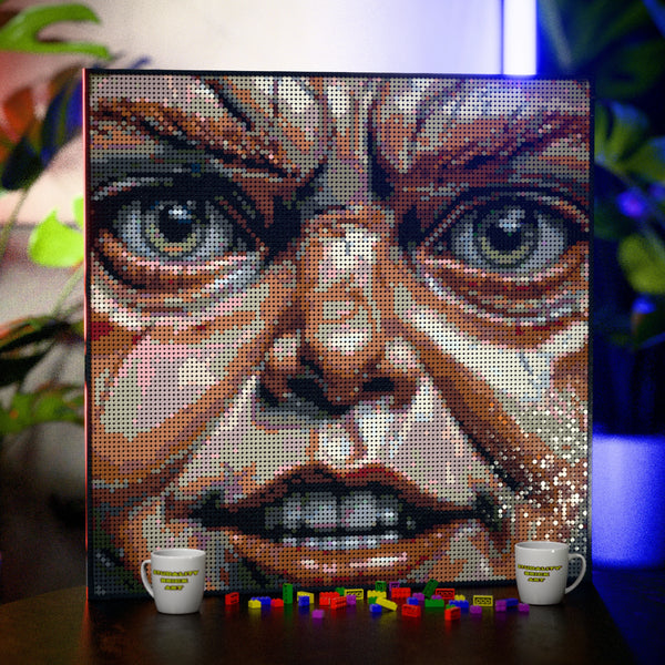 Chucky Inspired Evil Puppet made out of 13,153 LEGO-Compatible bricks on a table with stylish luxury studio background.