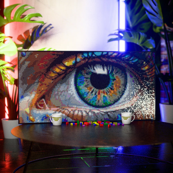 Eye Art Original made out of 13,433 LEGO-Compatible bricks on a table with stylish luxury studio background.