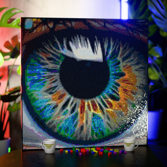 Eye Macro Art made out of 17,132 LEGO-Compatible bricks on a table with stylish luxury studio background.
