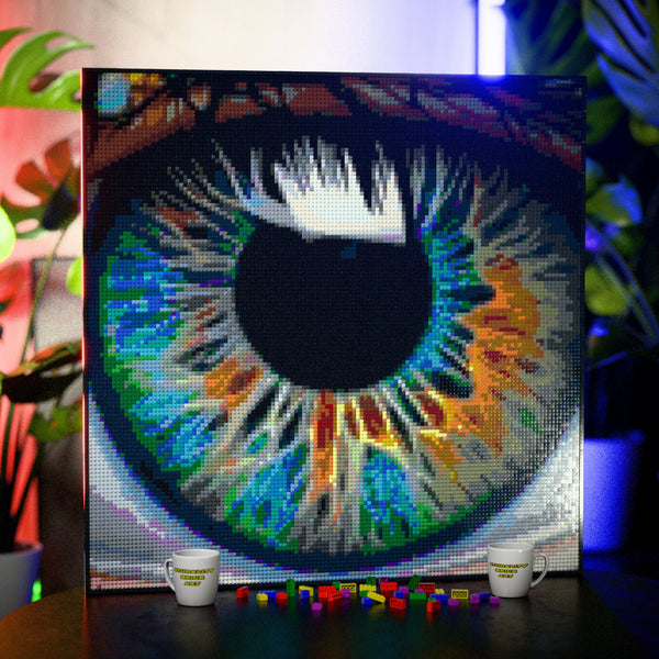 Eye Macro Art made out of 17,132 LEGO-Compatible bricks on a table with stylish luxury studio background, built with 1x1 square plates.