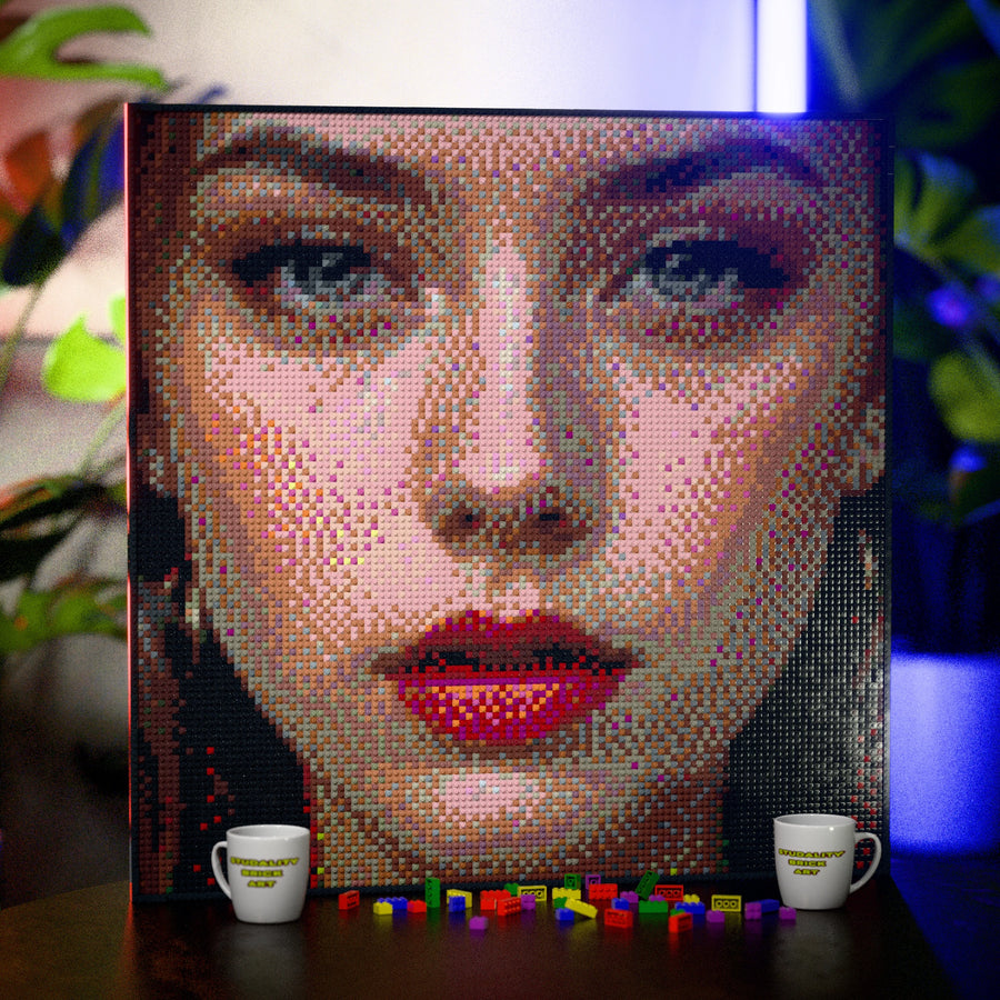 Eye Model Woman made out of 13,153 LEGO-Compatible bricks on a table with stylish luxury studio background, built with 1x1 square plates.