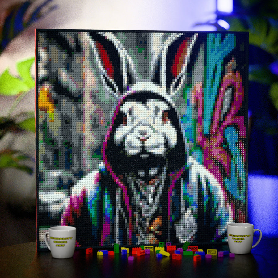 Rabbit in a Hoodie made out of 9,700 LEGO-Compatible bricks on a table with stylish luxury studio background, built with 1x1 square plates.