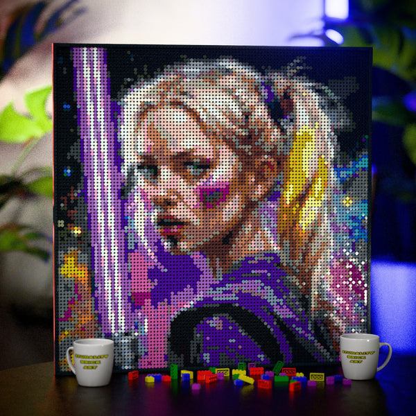 Woman with a laser light sword made out of 9,700 LEGO-Compatible bricks on a table with stylish luxury studio background.